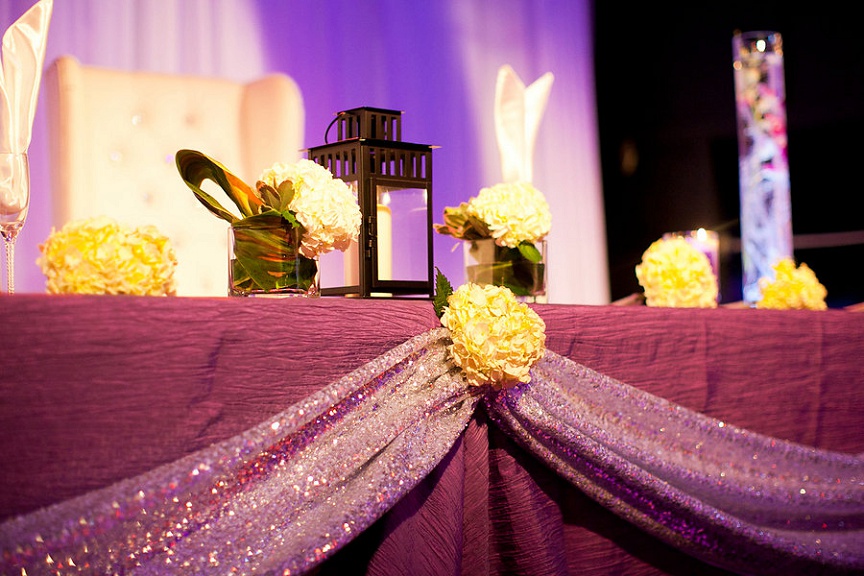 purple wedding decor and uplighting