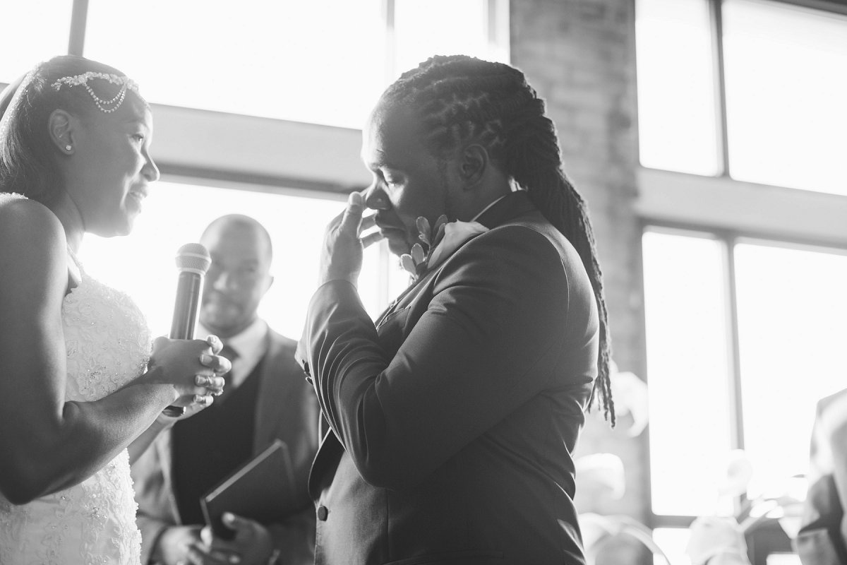 Emotional wedding ceremony moment.