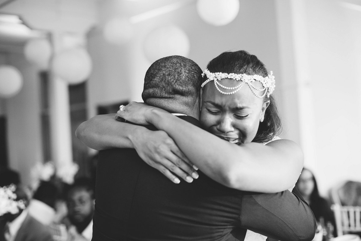 Emotional wedding ceremony moment.