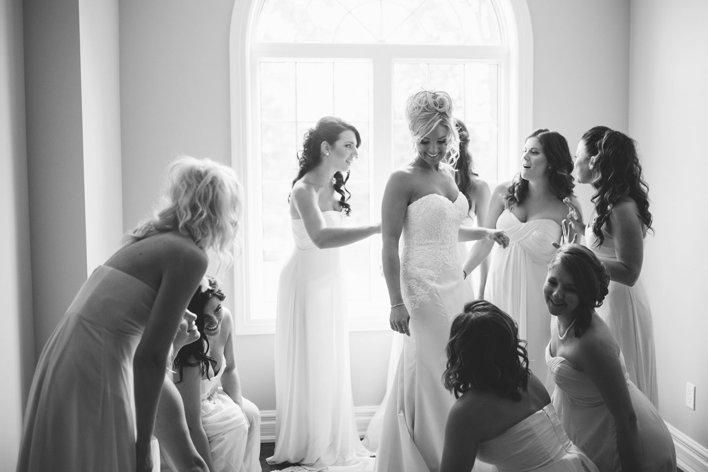 bride getting ready with bridesmaids