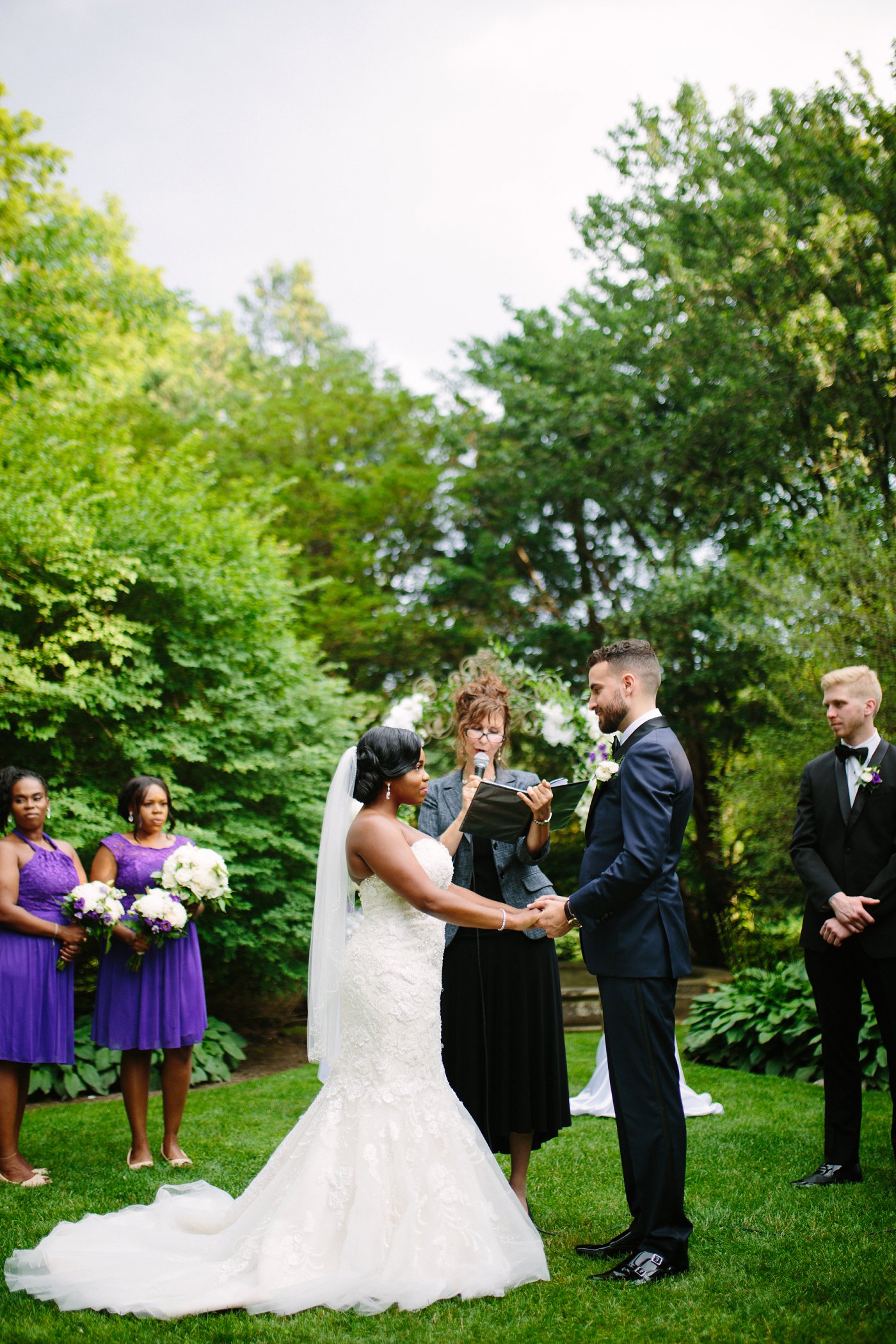 bride and groom wedding ceremony in outdoor venue
