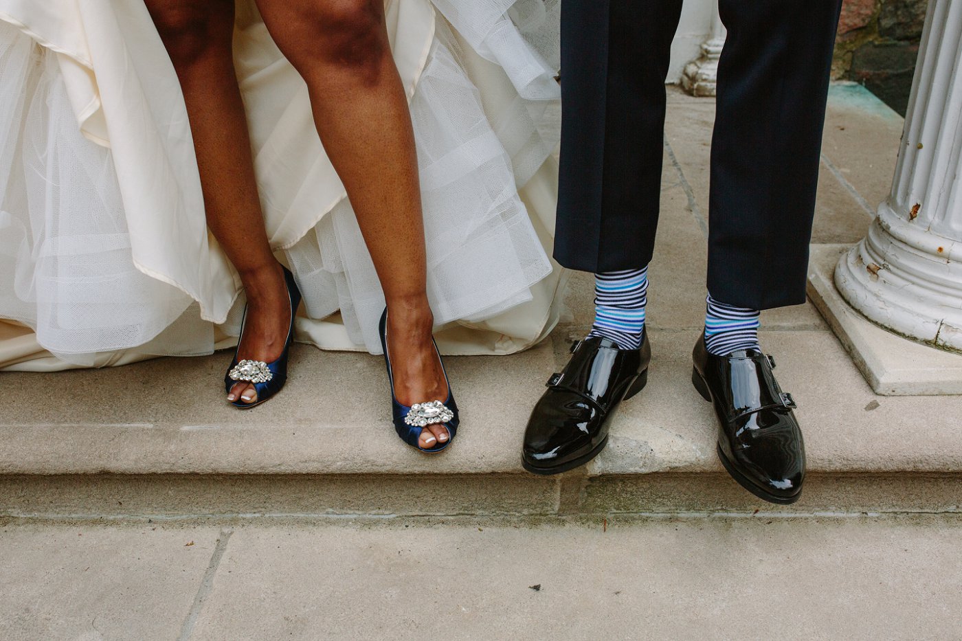 bride and groom wedding shoes and striped socks