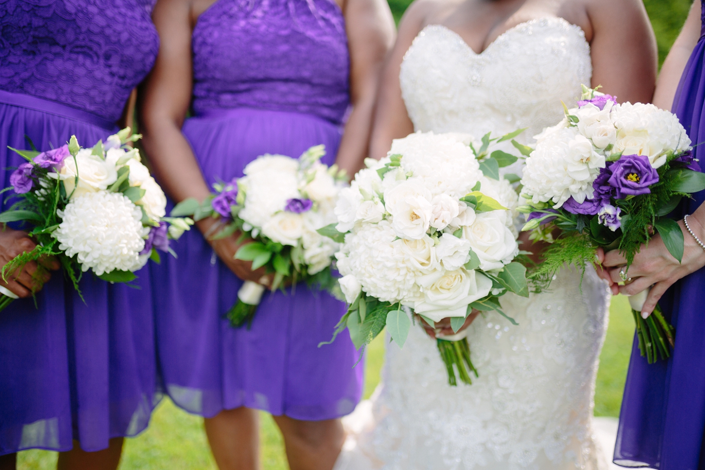 purple and white bridal floral bouquets