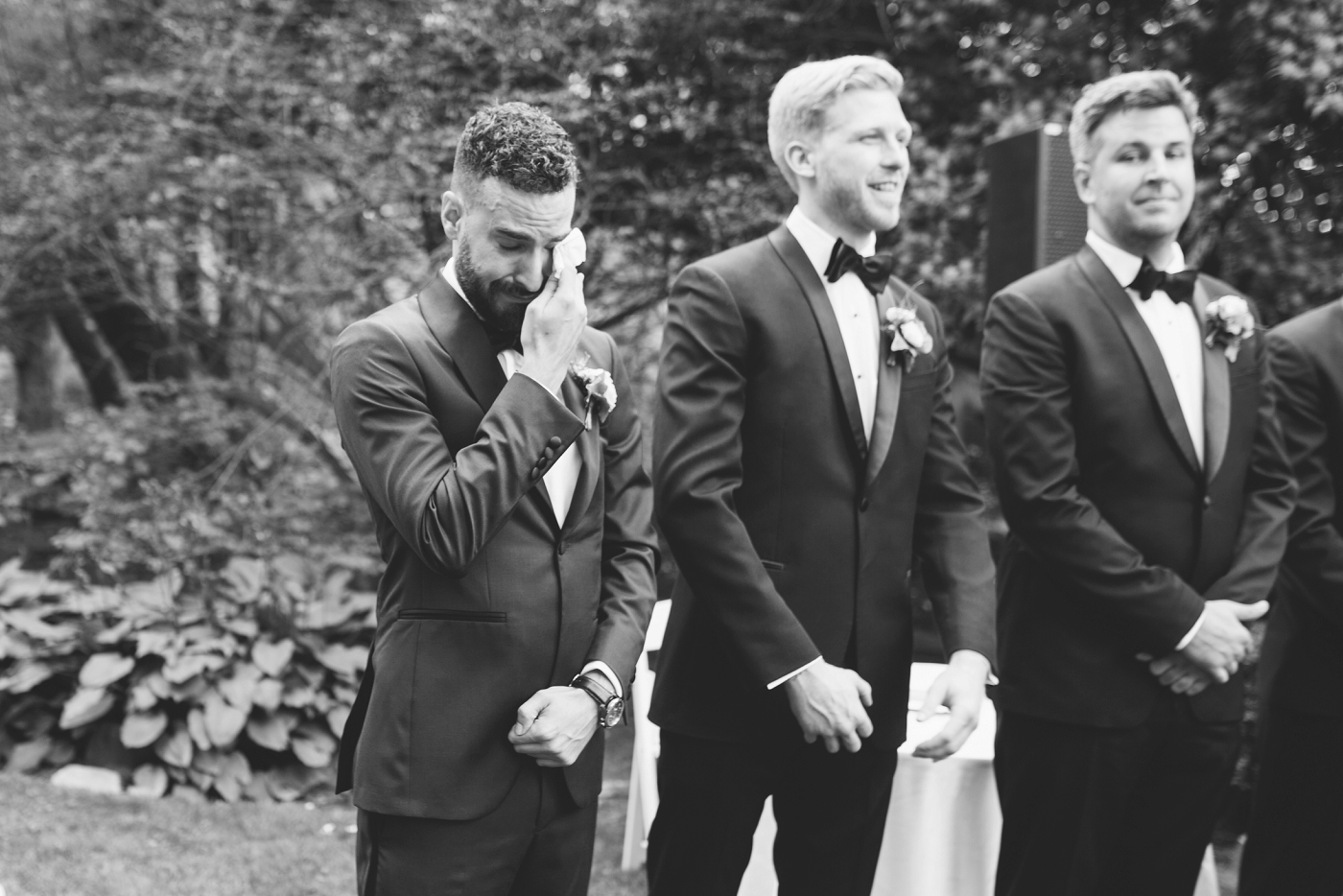 groom's emotional moment at wedding ceremony