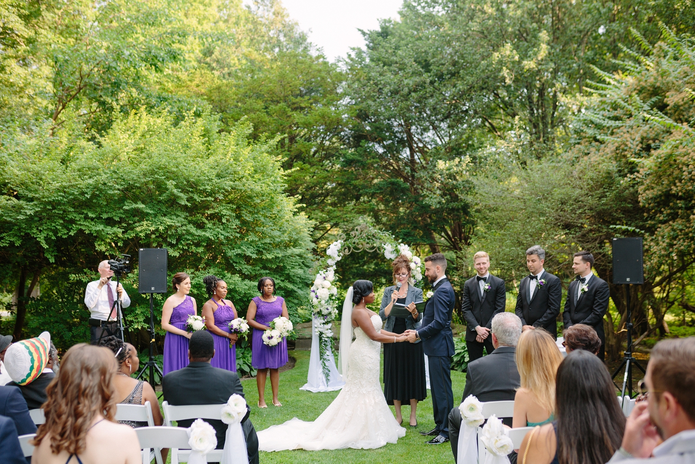 bridal party during outdoor wedding ceremony