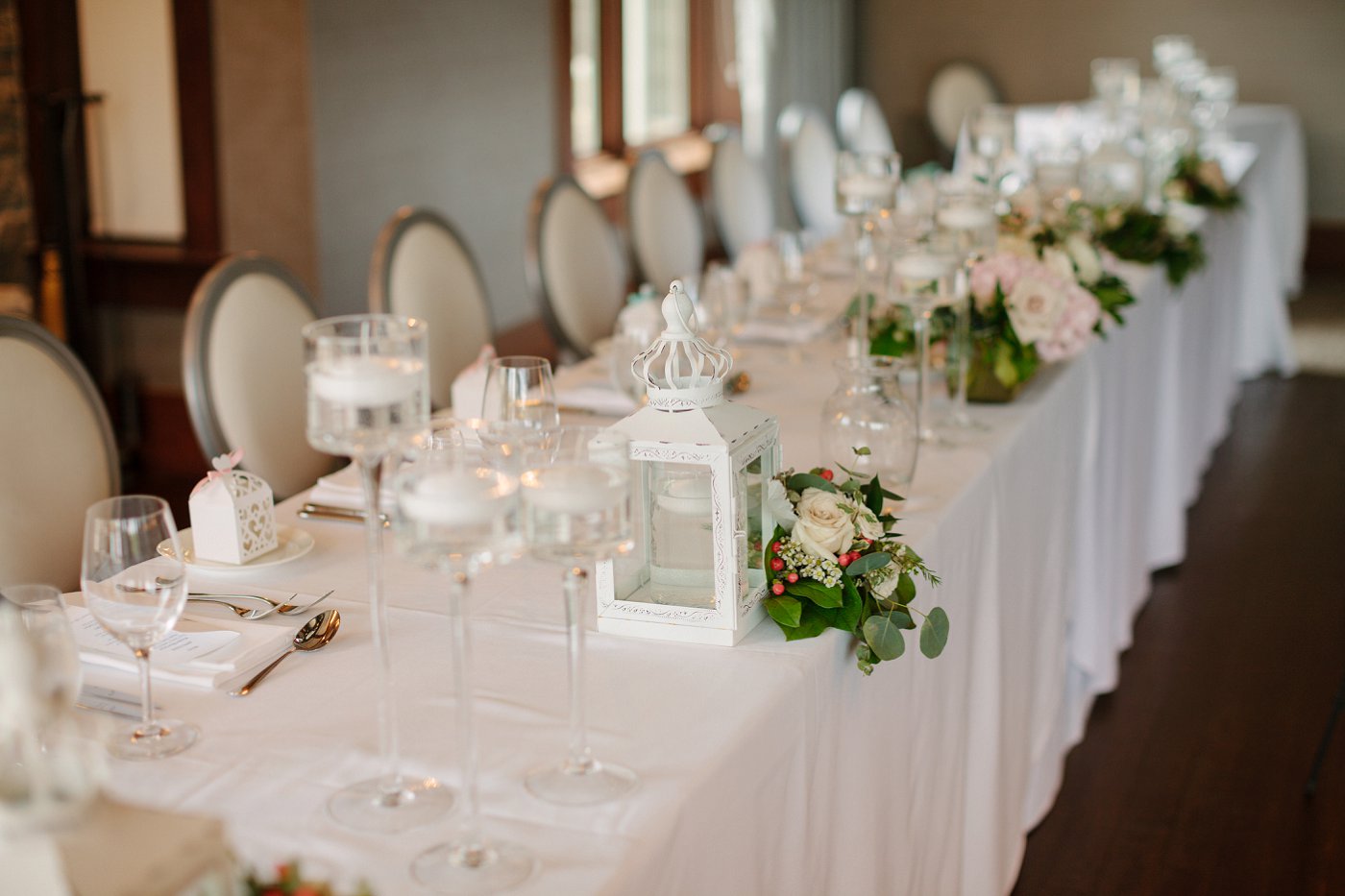 vintage lantern decor with white linen