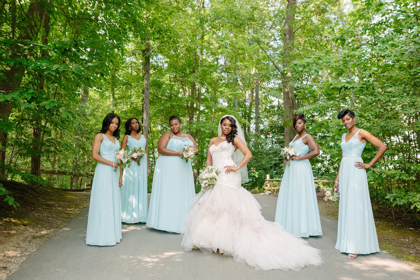 bridesmaids in solange wedding pose