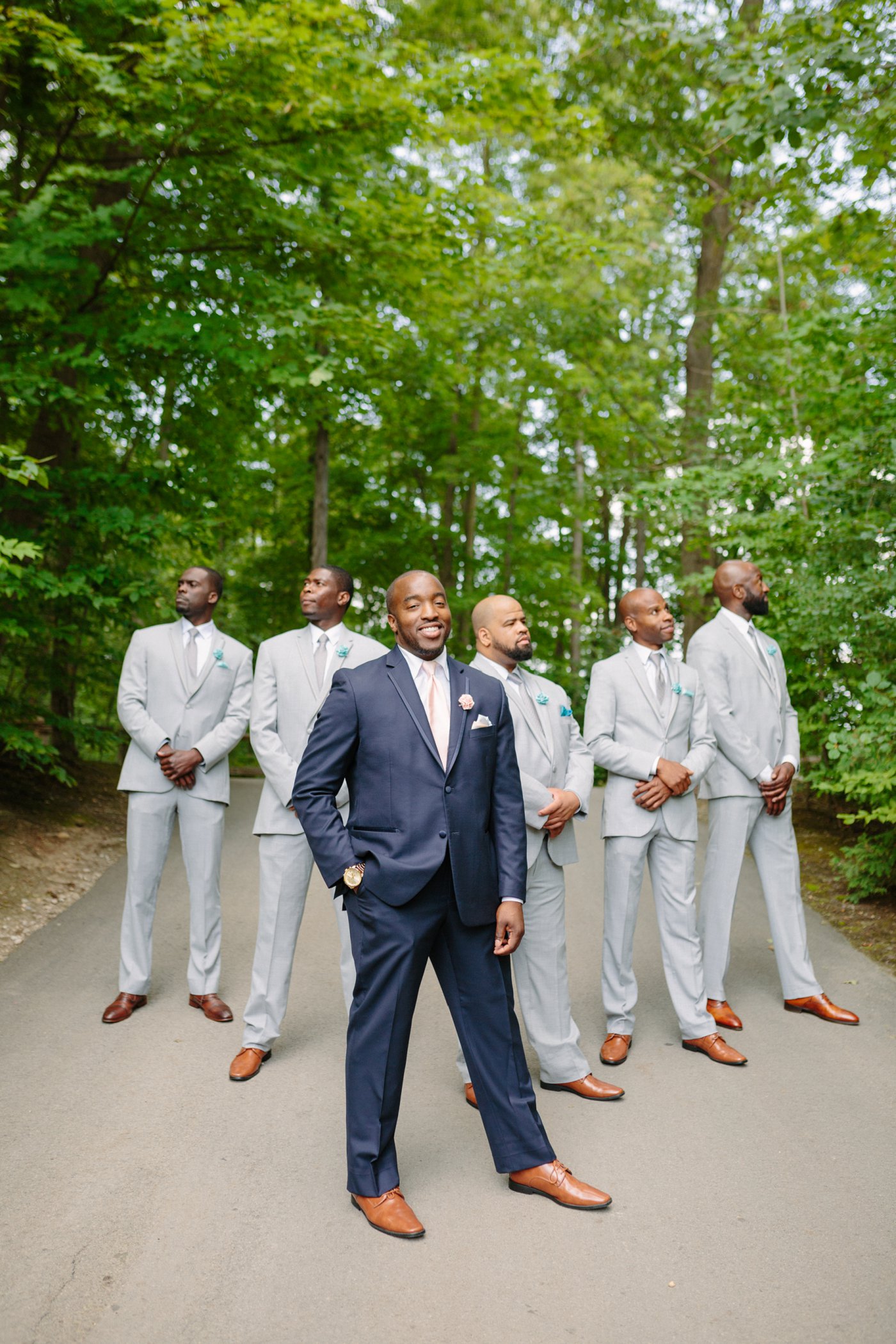 fun groomsmen pose wedding photography