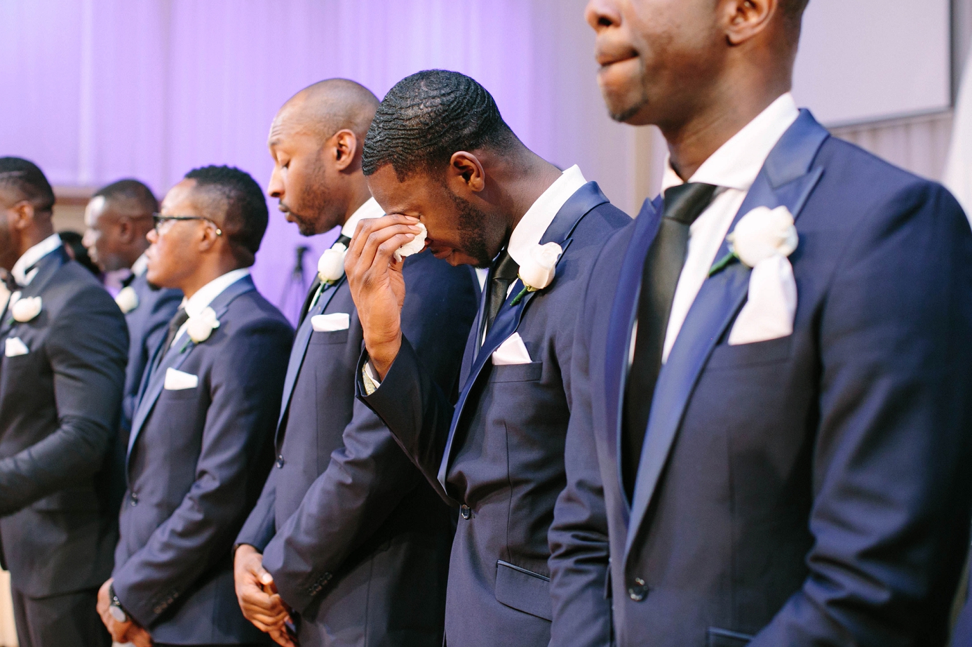 Emotional wedding ceremony moment.