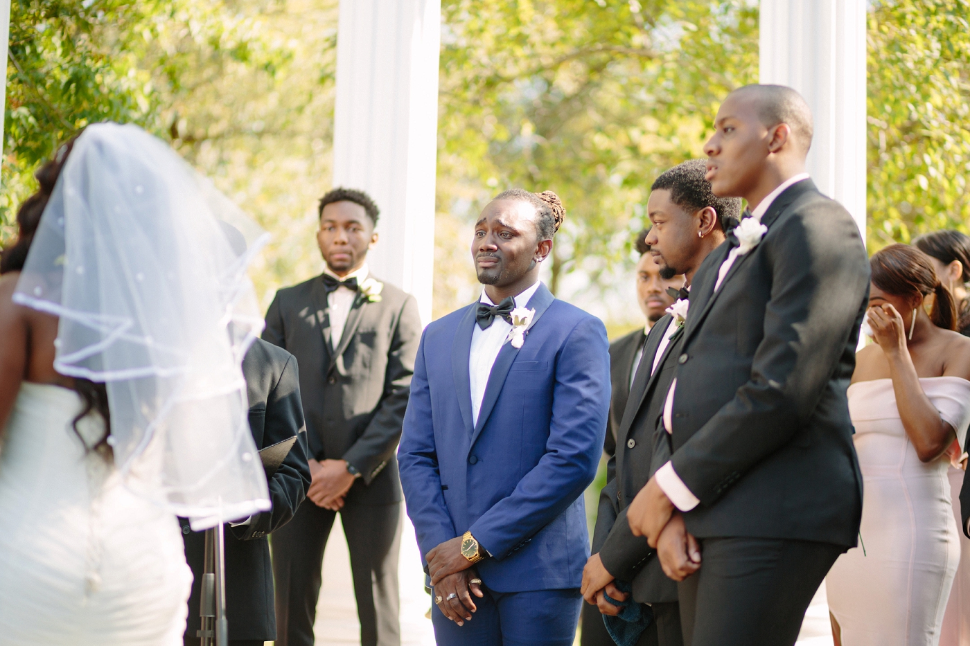 Emotional wedding ceremony moment.