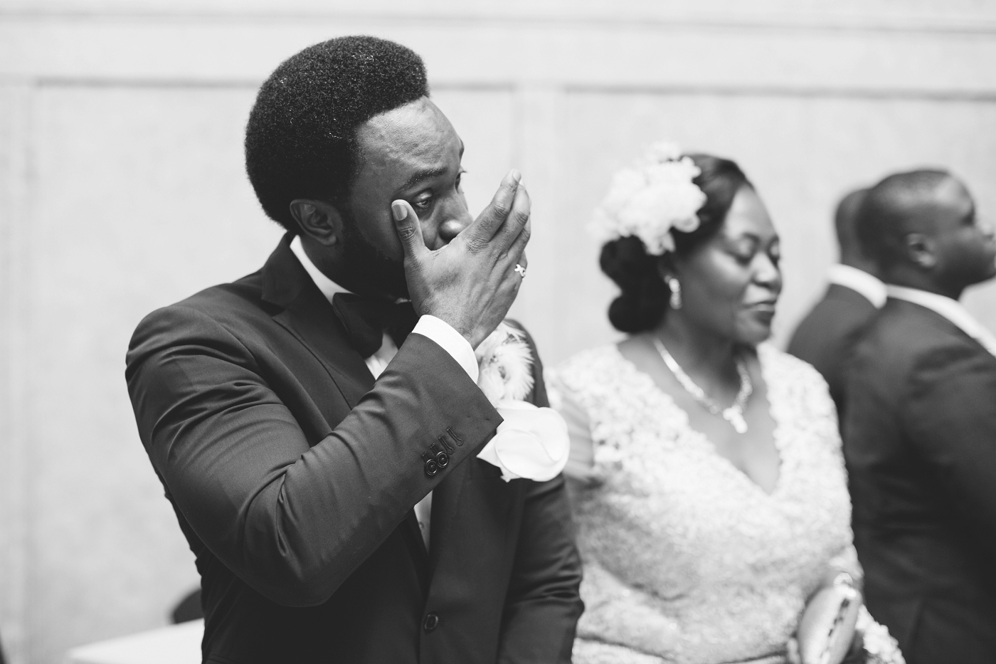 Emotional wedding ceremony moment.