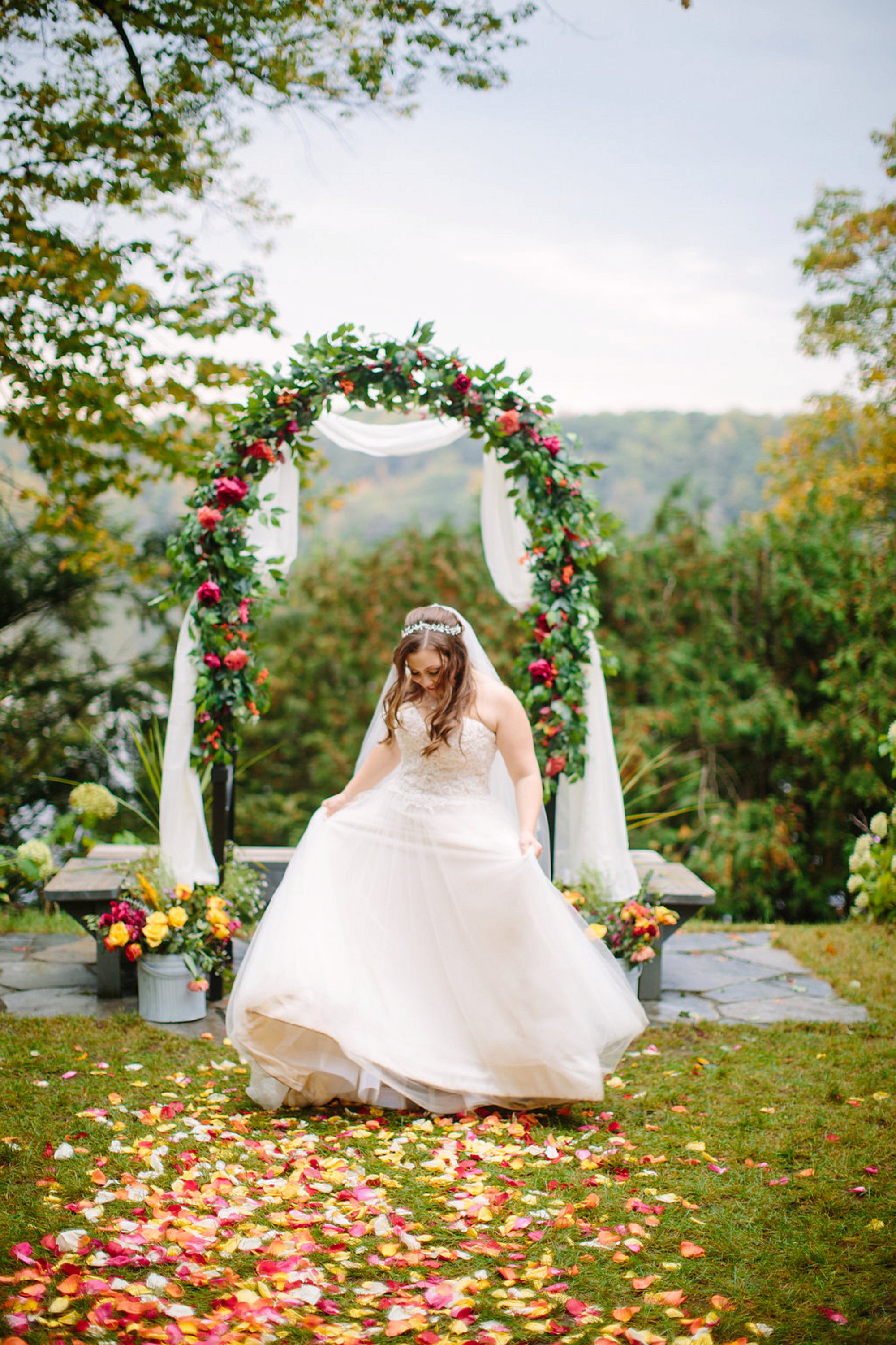 jewish bride with floral chuppah
