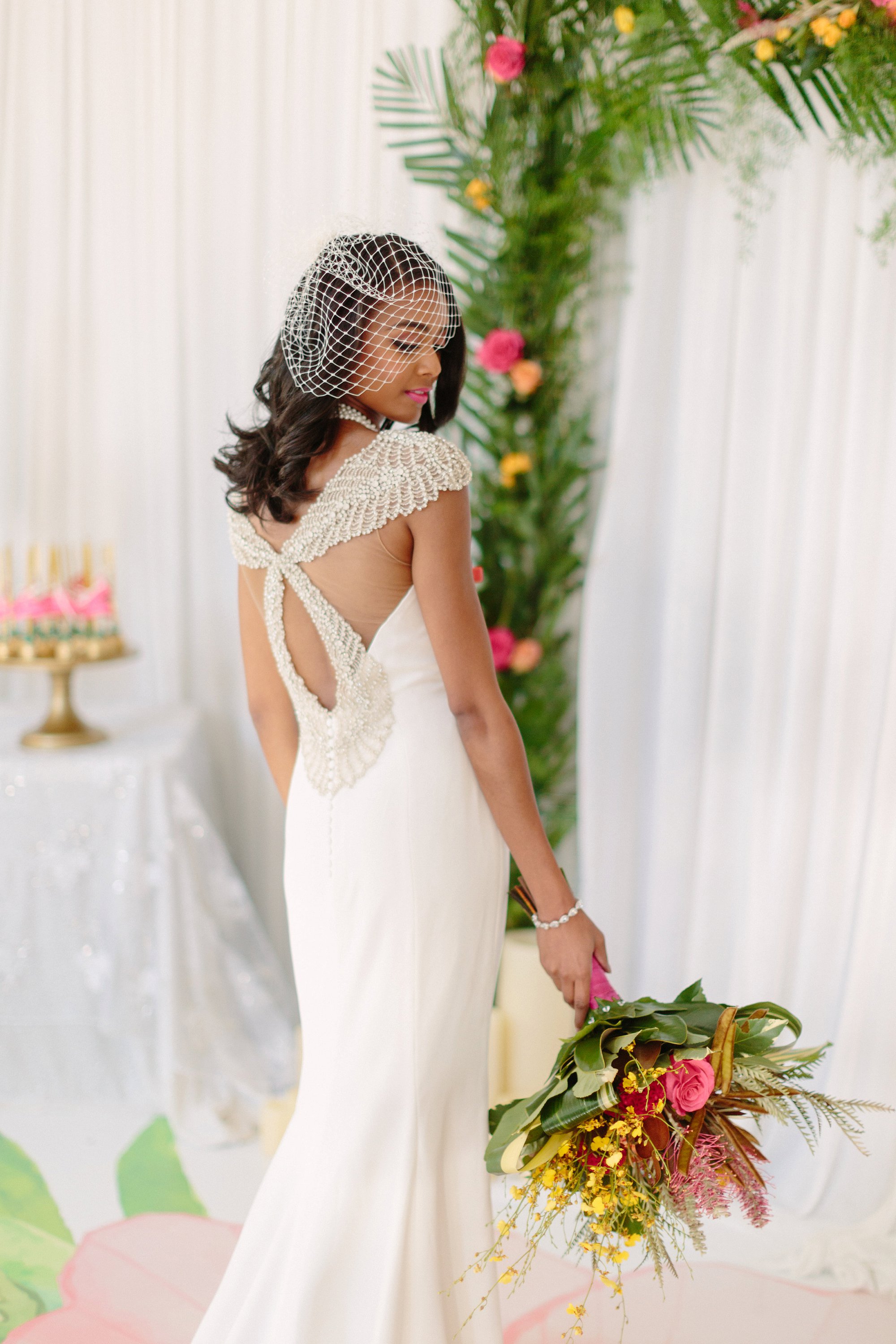 backless destination wedding dress. Photography by Samantha Clarke
