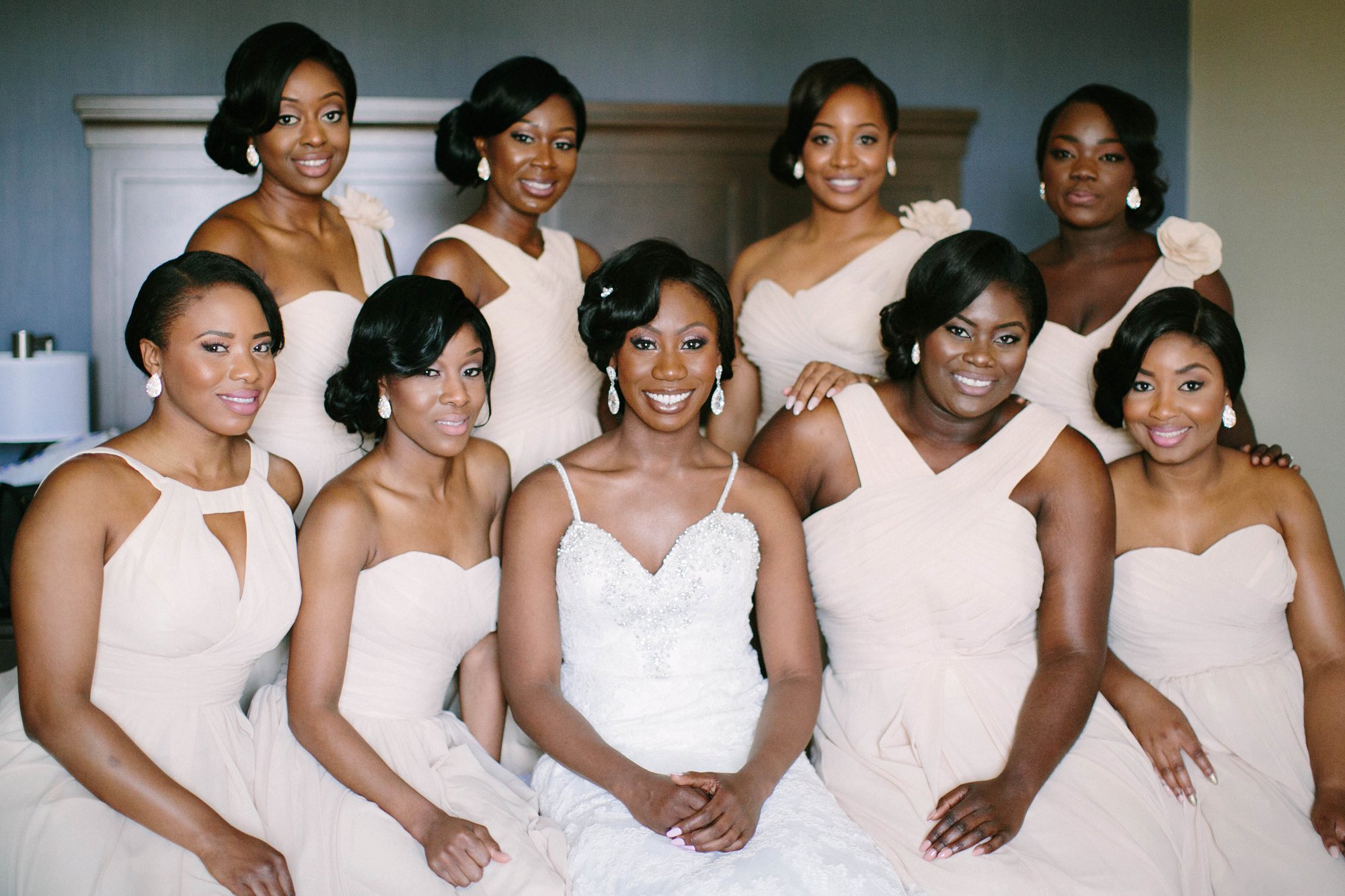 Bridemaids wearing tan colored bridesmaid dresses