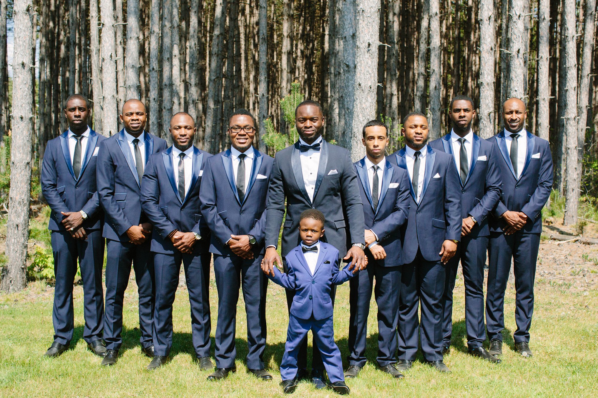 Groomsmen in navy blue suits. Atlanta Georgia wedding photographer Samantha Clarke
