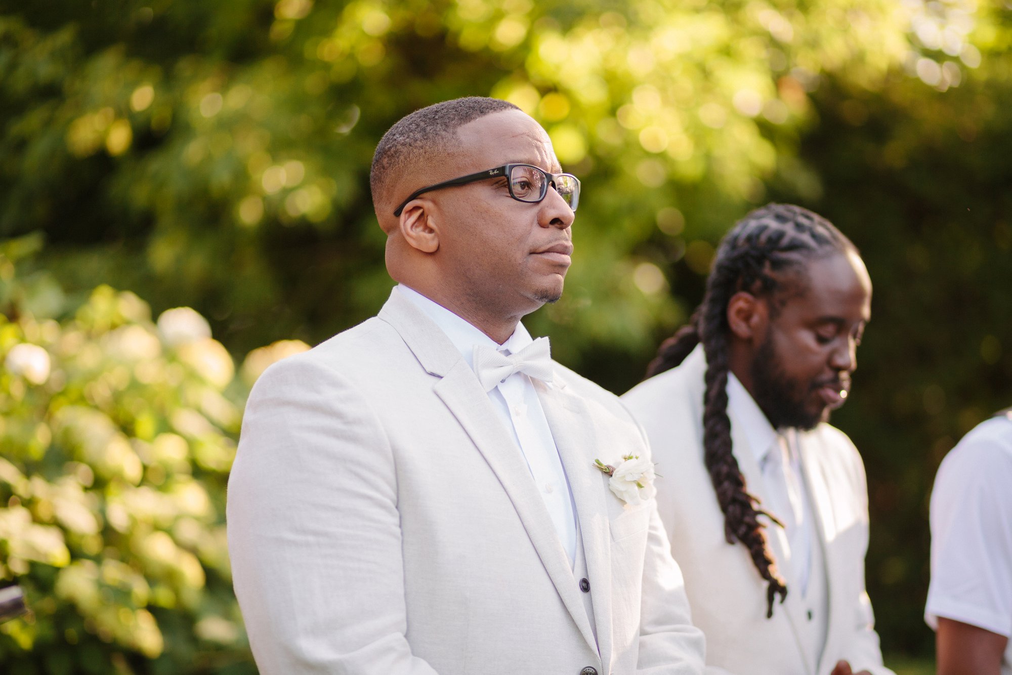 Groom and groomsmen in white linen suit