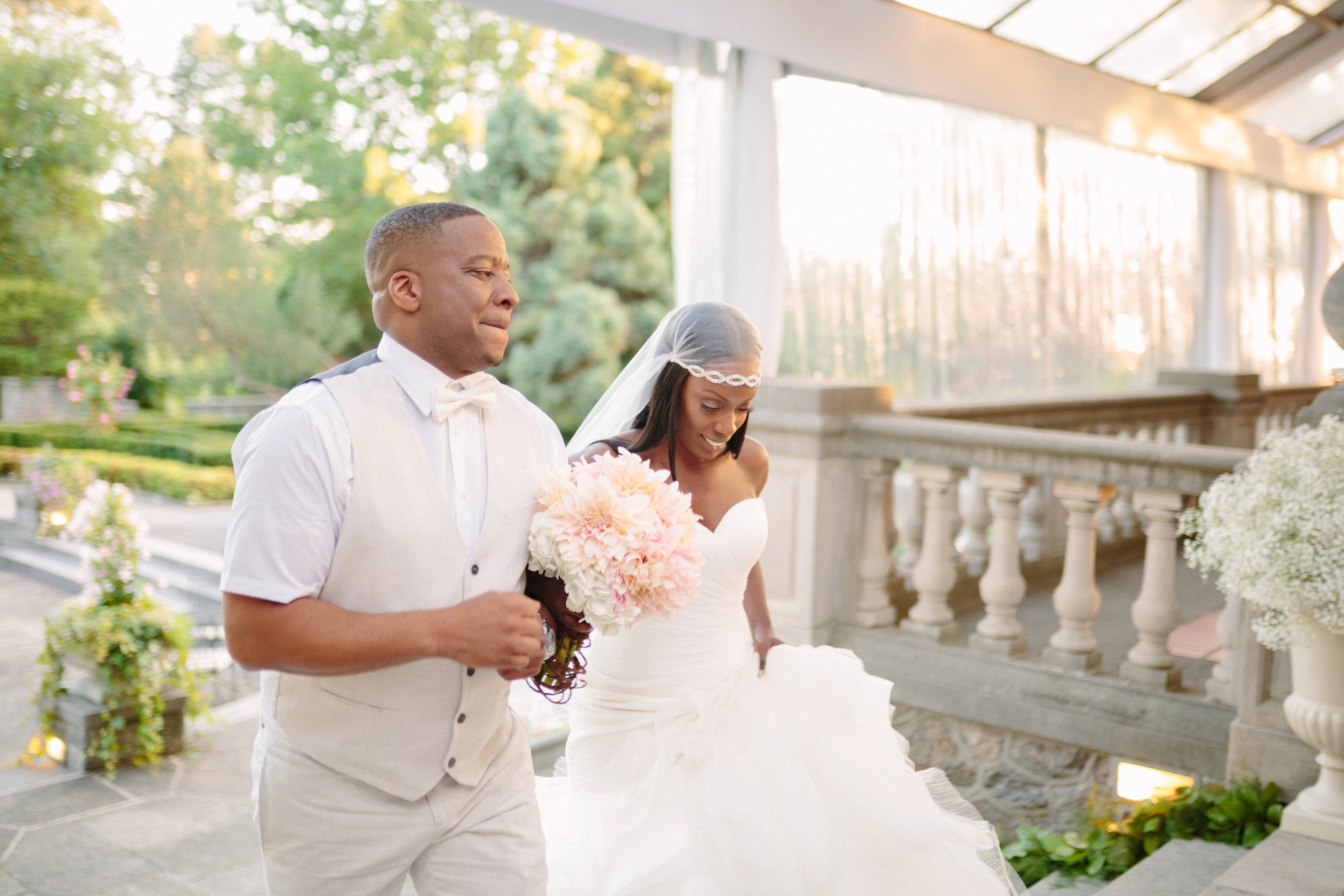 bride and groom enters wedding reception