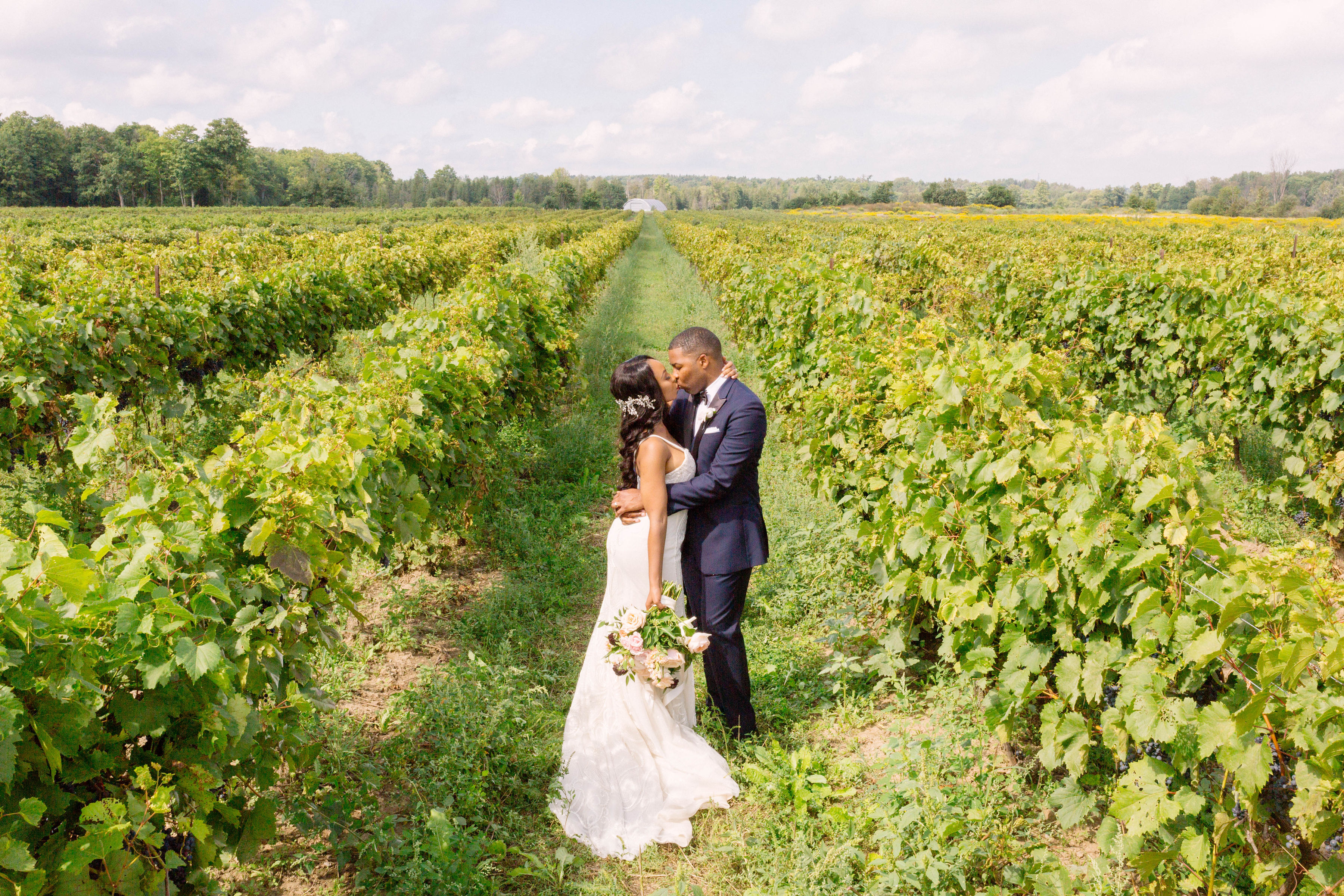 groom and bride in vineyard