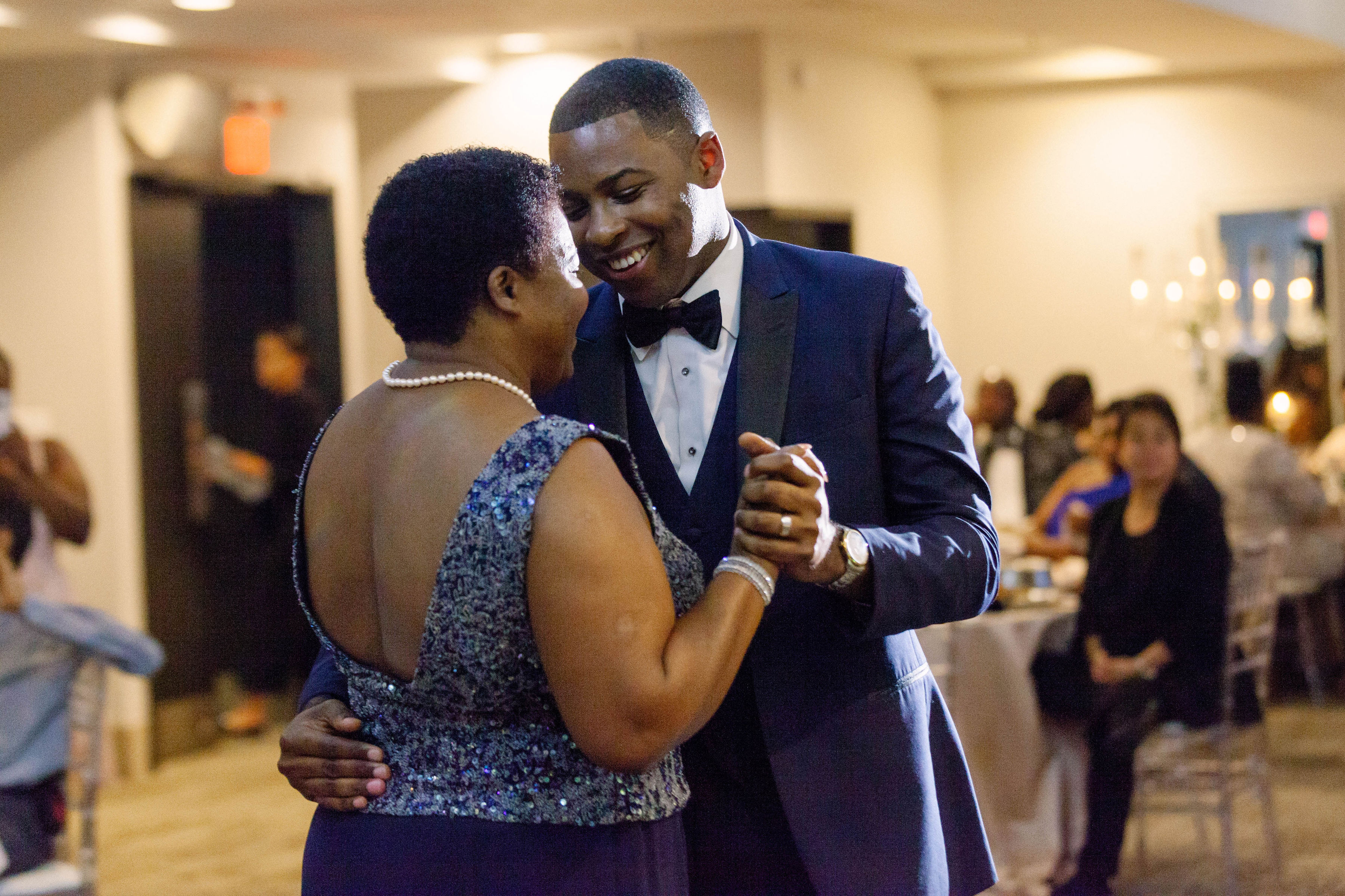 Groom and mother dance at The Manor by Peter and Paul's