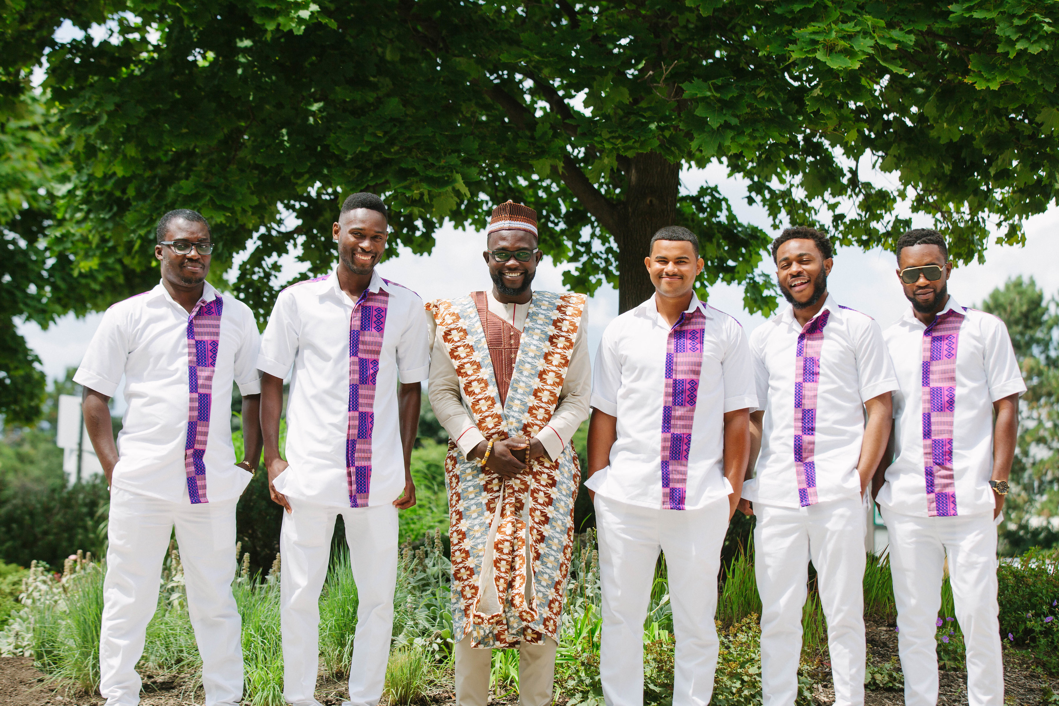 groom and groomsmen in traditional african clothing