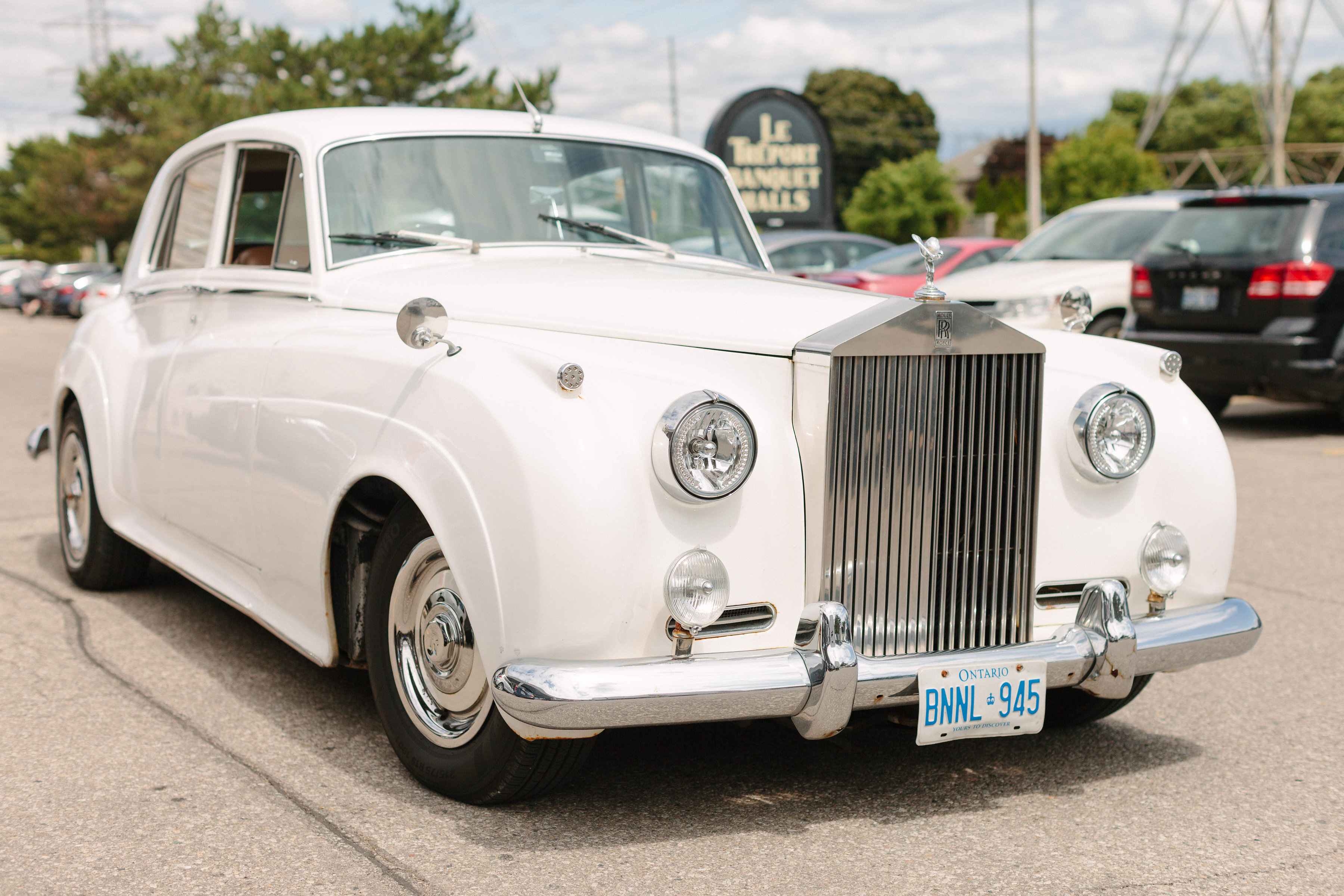 bride and groom car