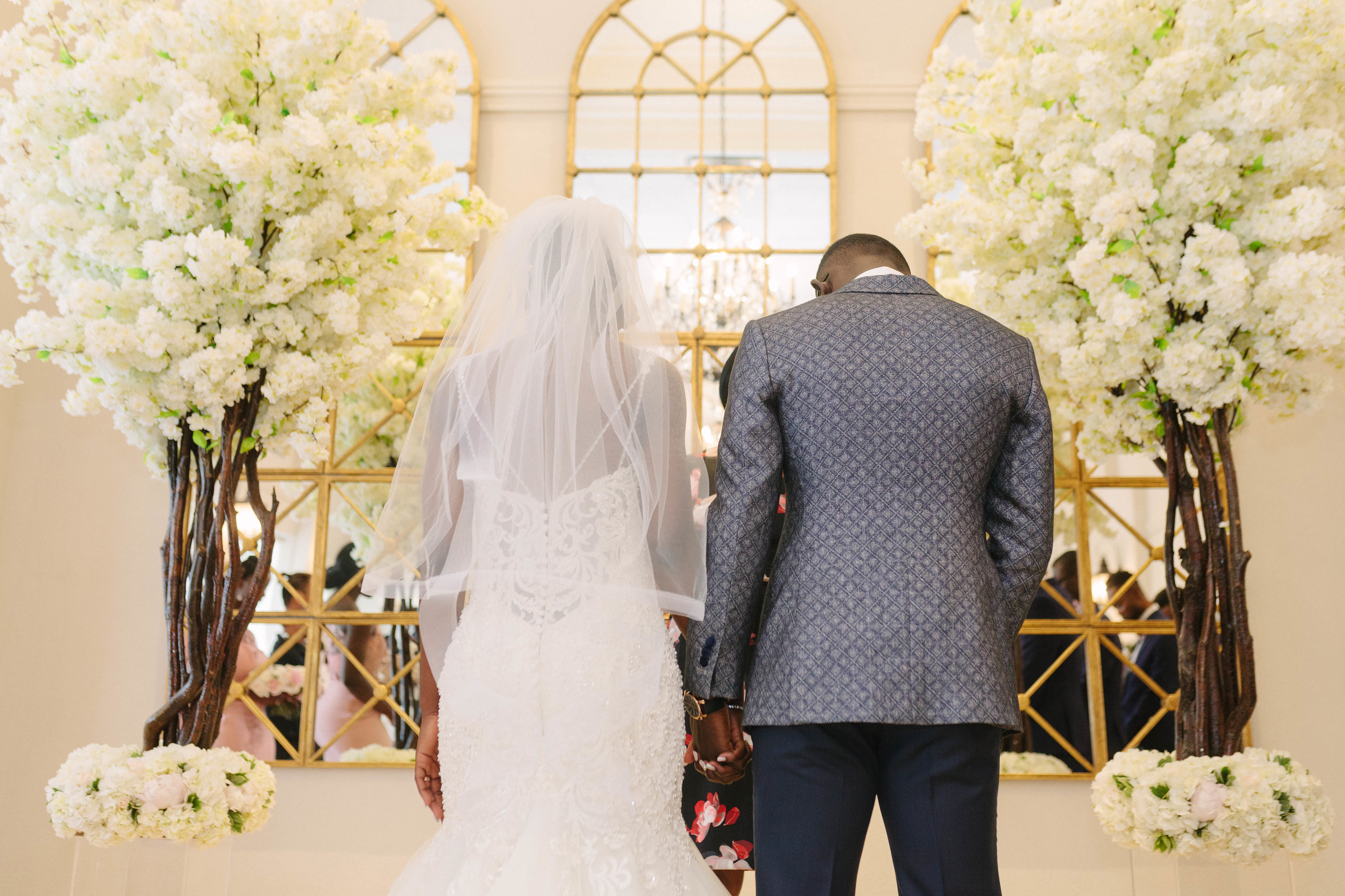 bride and groom at alter