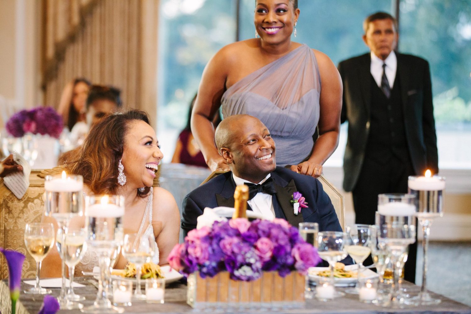 Bride and Groom laughing at reception, Oheka Castle wedding photography.