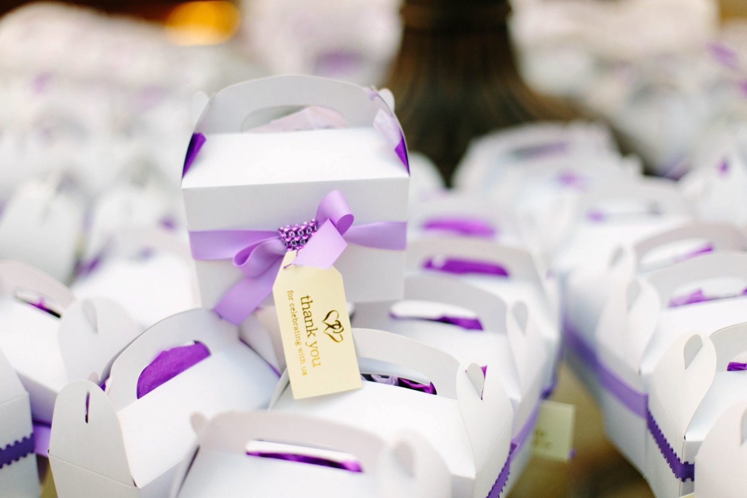 Black cake wedding favors at New York wedding, Oheka Castle.