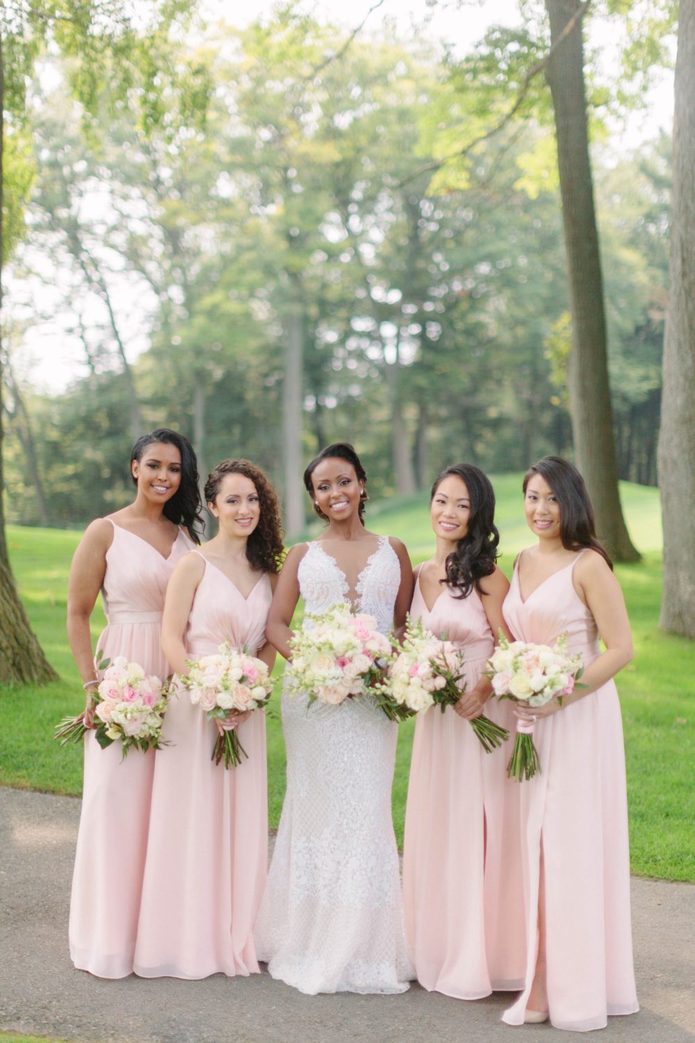 Bridesmaids in blush pink dresses at Toronto Hunt Club wedding by Samantha Clarke Photography