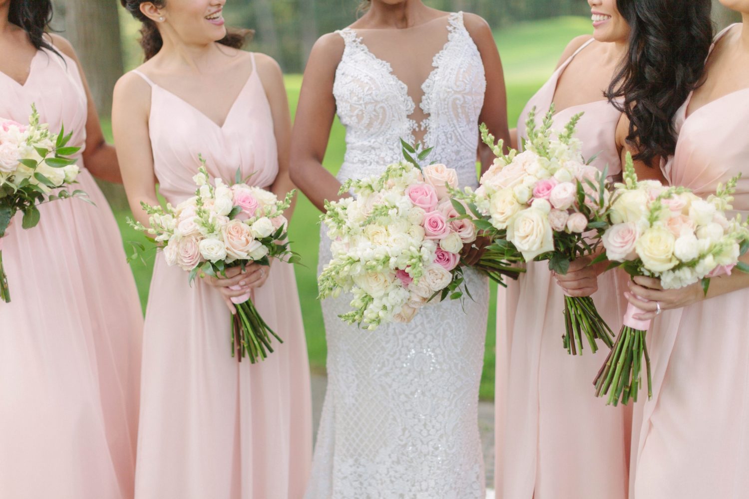 Blush and white bouquets with roses 